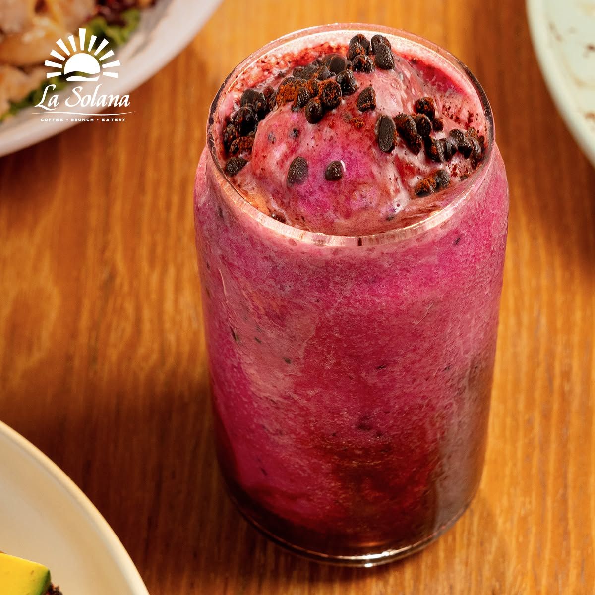 Black Pink smoothie made with red dragon fruit and cocoa