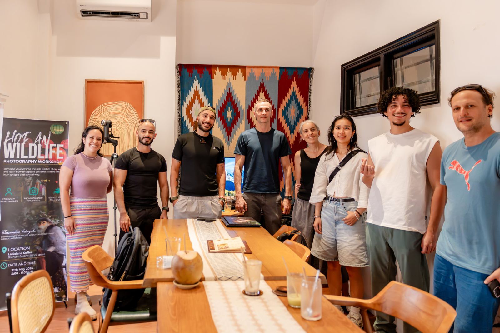 Participants of the Hội An wildlife photography workshop in the six-seat meeting room